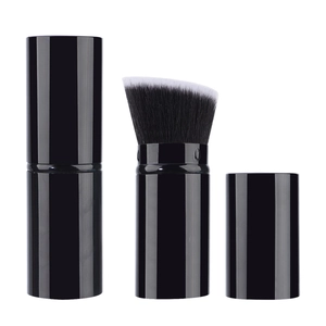 Portable retractable makeup brush with dense dual-tone bristles and sleek black design