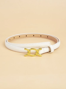 Detail shot of the white leather belt with double gold circular metal buckles and holes