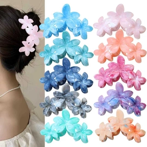 Elegant floral ABS hair claw clips for women in various marble colors and patterns
