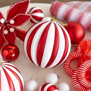 Festive red and white Christmas tree ornaments set with striped and matte candy designs