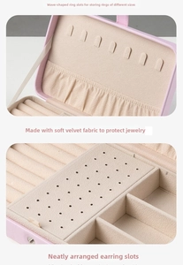 Pink PU leather jewelry box detail with velvet ring slots and stud earring holder