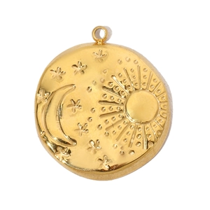 Macro shot of gold stainless steel sun moon and stars engraved coin pendant charm