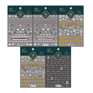 5D Christmas embossed nail art stickers featuring Santa, gingerbread men, and snowflakes