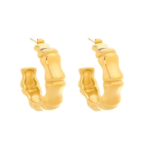 Minimalist golden stainless steel bamboo hoop earrings with a textured finish on white back