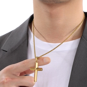 Minimalist gold cross pendant necklace for men featuring a classic polished twist chain