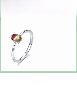 Macro shot of 925 silver ring featuring a 4mm by 6mm oval gradient faux tourmaline stone