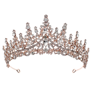 Macro detail of rose gold tiara with sparkling crystal rhinestones and intricate metalwork