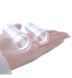 Close-up of clear silicone nail stamps with transparent handles for DIY nail art design