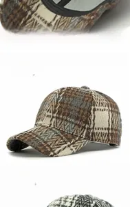 Detailed view of plaid baseball hats in brown and black-white checkered tweed fabric