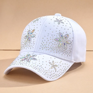 White cotton baseball cap with colorful rhinestone flower patterns and iridescent finish