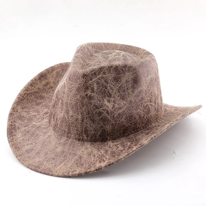 Detail shot of the vintage brown western cowboy hat with a unique cracked texture design
