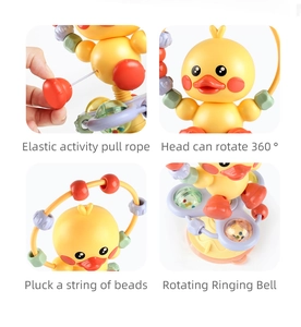 Detail view of baby toy showing spinning head, elastic ropes, and colorful sensory beads