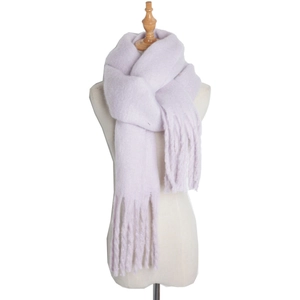 Detail of lavender mohair scarf texture with long tassels on a white background