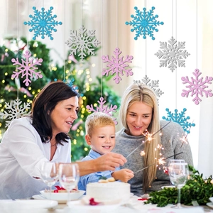 Glittering blue pink and silver snowflake hanging ornaments for winter party Christmas decor