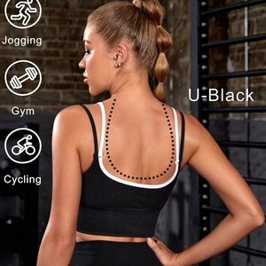 U-shaped open back sports bra in black and white stitching for gym jogging and cycling