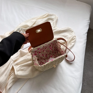 Handmade straw crossbody bag in beige and brown leather with floral lining interior