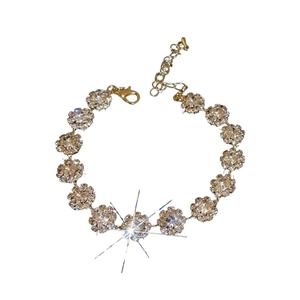 Luxury gold-tone necklace featuring sparkling waterdrop pendants and cubic zirconia accents