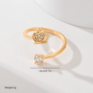 Detail showing gold-plated crown ring size 1.8cm and 3g weight with cubic zirconia