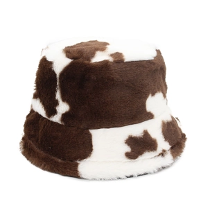 Brown and white cow print faux fur bucket hat with thick plush warm winter material