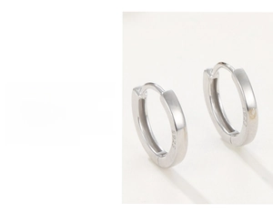 Detailed macro view showing S925 sterling silver stamp on thick triple-plated hoop earring