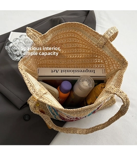 Beige woven tote bag showing large interior capacity with umbrella and daily items