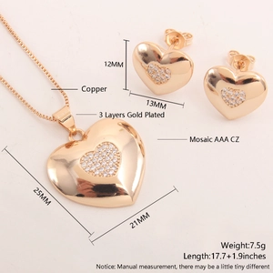 Detailed view of 18k gold plated heart pendant and earrings set with size specifications