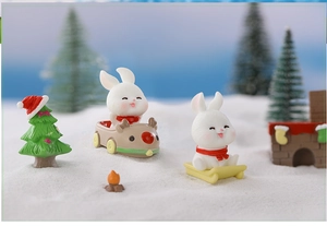 Miniature resin Christmas rabbits in sleigh and reindeer car set with cozy fireplace scene