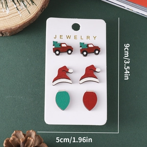 Christmas stud earring set featuring red truck, Santa hat, and colorful bulb designs