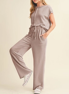 Detail view of women's waffle knit lounge set with short sleeve top and drawstring pants