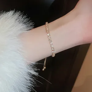 Elegant gold-plated zircon tennis bracelet with adjustable slider clasp for women