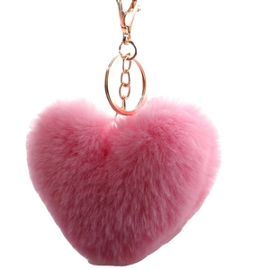 Pink heart-shaped faux fur keychain with a gold metal ring and lobster clasp for bags