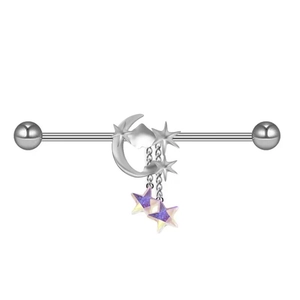 Detail of silver industrial barbell with celestial moon stars and purple charms