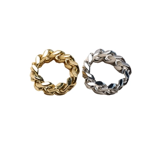 Minimalist interlocking chain rings in gold and silver finishes with a polished look