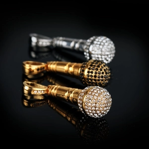 Hip hop microphone pendants in gold and silver with sparkling pave-set crystals