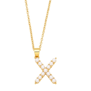 Detailed view of gold X-shaped pendant necklace featuring inlaid white imitation pearls