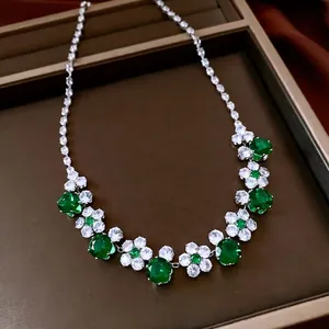 French vintage necklace with large green oval gemstones and crystal flower pendants