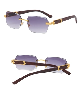 Detail view of rimless square sunglasses with wood grain temples and gradient purple lenses