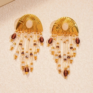 Bohemian gold tassel earrings with white oval stones and vintage glass beads for women