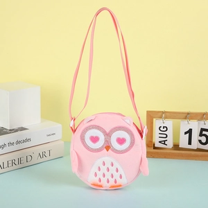 Cute pink owl plush crossbody bag for kids with soft faux fur and cartoon heart-eyes