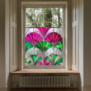 Colorful PVC static cling window film detail showing decorative stained glass fan pattern.