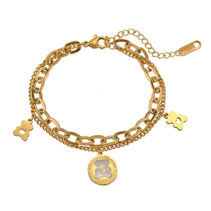 Golden double-layer chain bracelet featuring cute bear pendants and white shell inlay