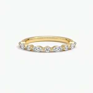 Macro view of gold s925 silver ring featuring alternating round and marquise moissanite