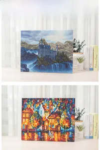 Detailed comparison of finished diamond paintings featuring castle and European city street