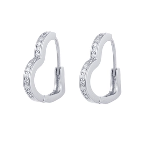 Macro shot of silver heart earrings with sparkling pavé zircons on a white background