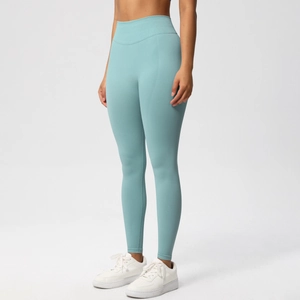 Detail of high-waist seamless yoga pants in light blue with breathable performance fabric