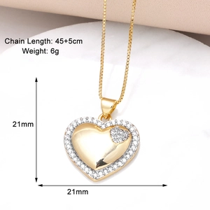 Detail of gold heart pendant necklace with chain length 45+5cm and weight of 6g