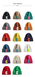 Detailed collection of 17 colorful ribbed knit beanies featuring towel embroidered C patch