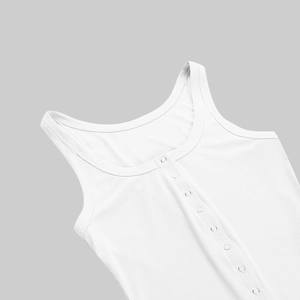 Detailed close-up of white ribbed knit fabric and button neckline on sleeveless crop top