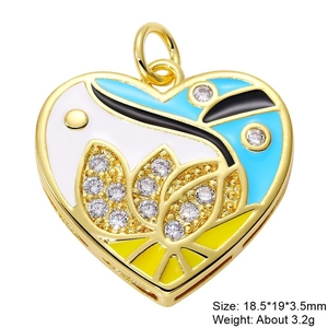 Macro shot of heart-shaped enamel charms with cubic zirconia and gold plating details
