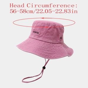 Detail of pink cotton hiking hat showing heart embroidery and adjustable chin strap